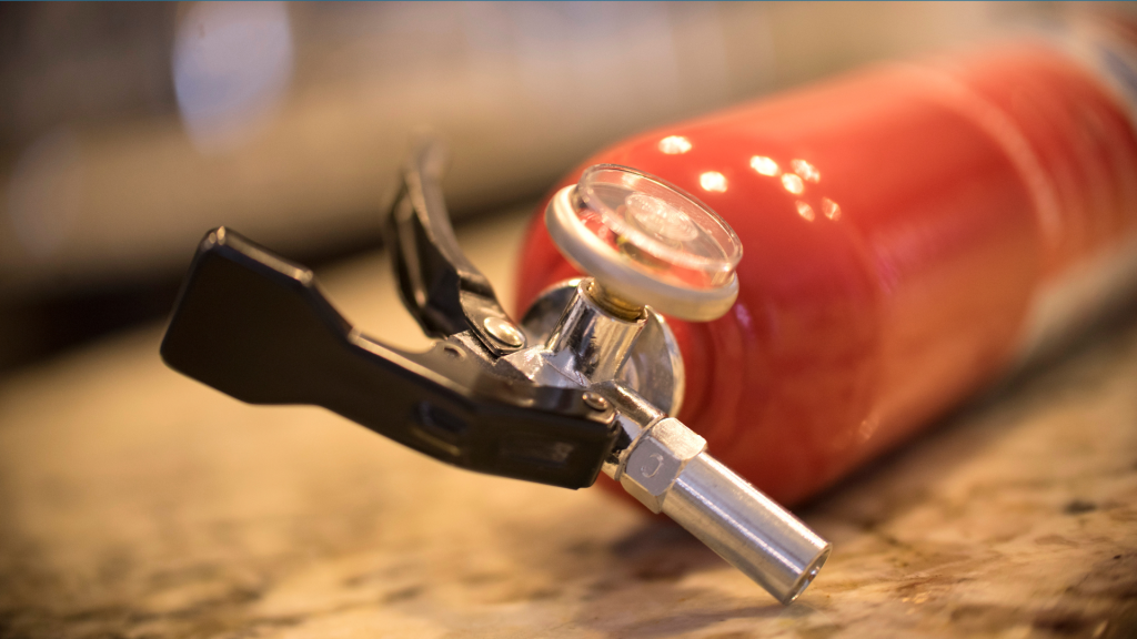 What happens if a fire extinguisher is not serviced